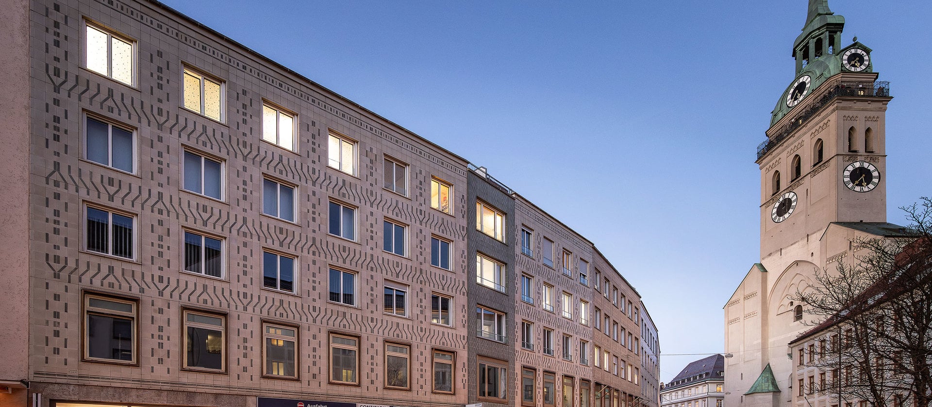 Existing ceramic façade – new windows.