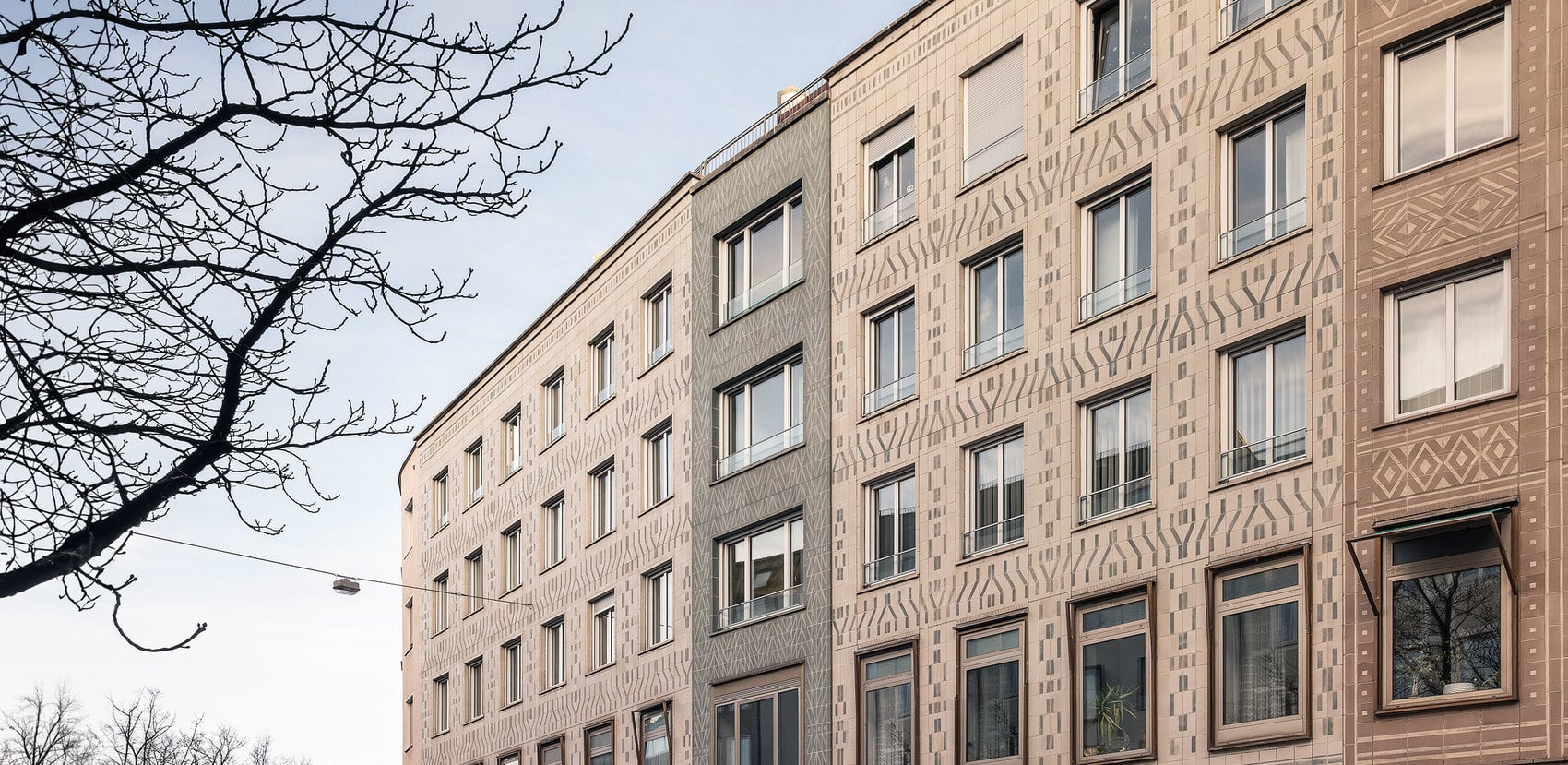 Existing ceramic façade – new windows.